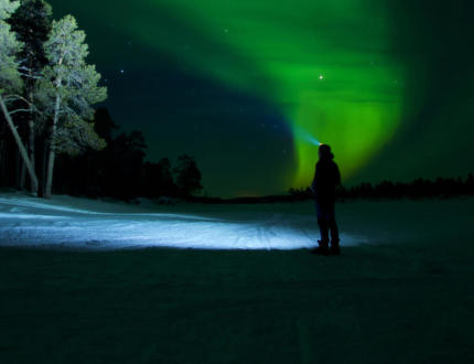 Přechod zamrzlého jezera Inari